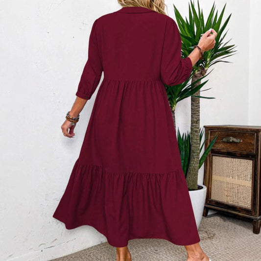 Robe ample à col polo et poignets élastiques de couleur unie